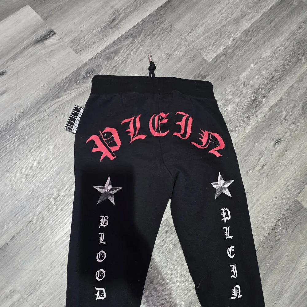 Philipp Plein Black Joggers with Red and White Accents - Picture 3 of 7